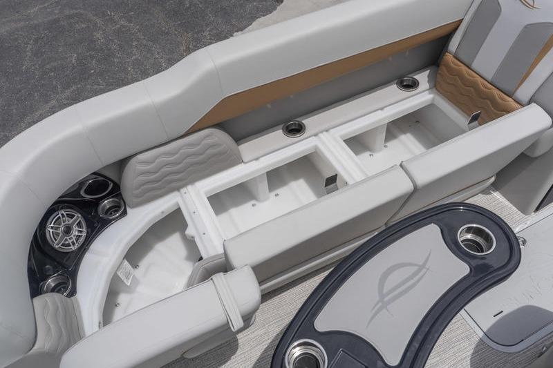 2026 SunCatcher Elite 326 SS boat interior with seating and storage compartments.