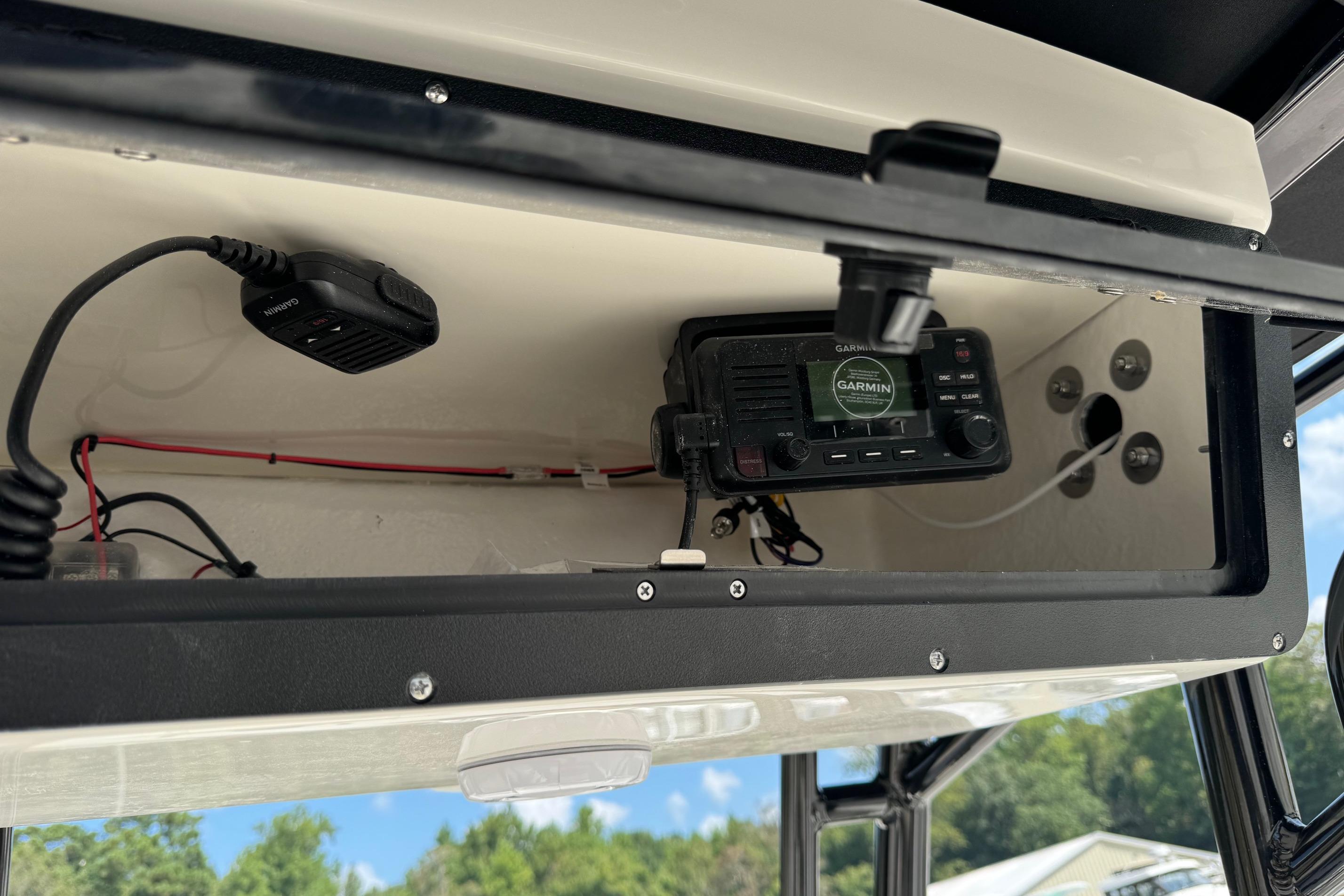 Interior view of a 2025 Key West 203 FS boat with Garmin radio equipment.