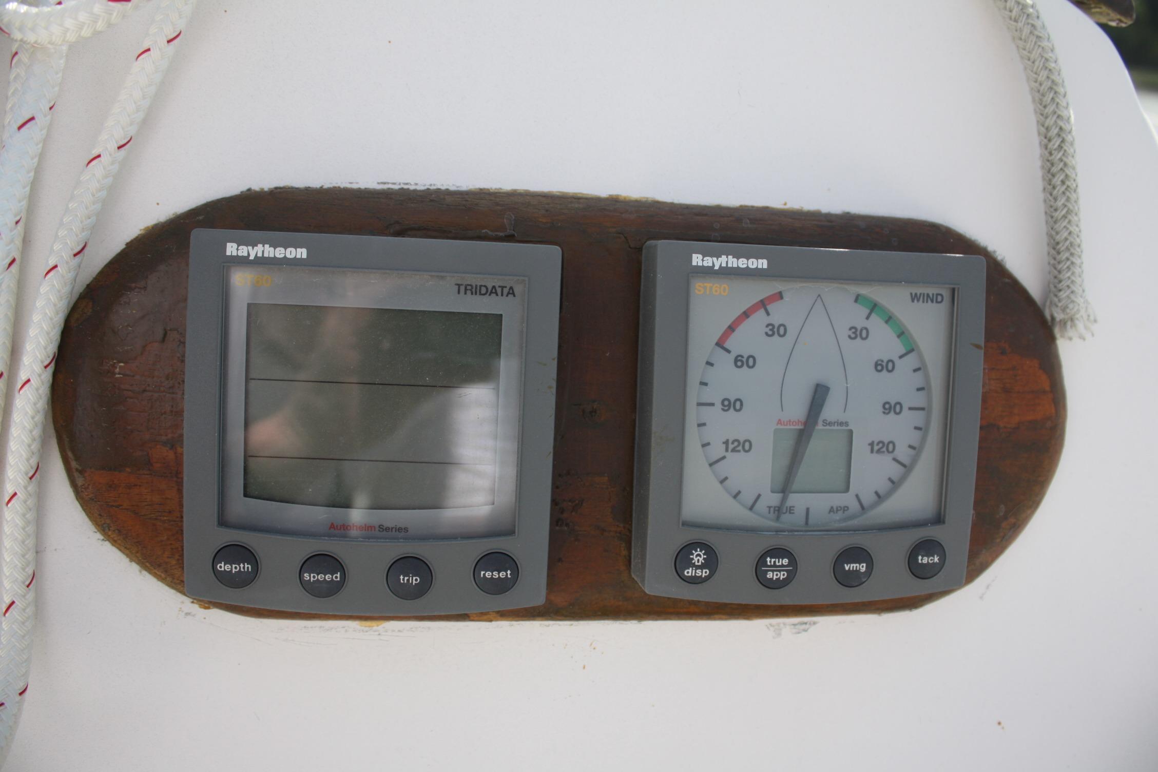 Raytheon marine instruments on 1981 S2 9.2A sailboat, displaying wind and depth data.