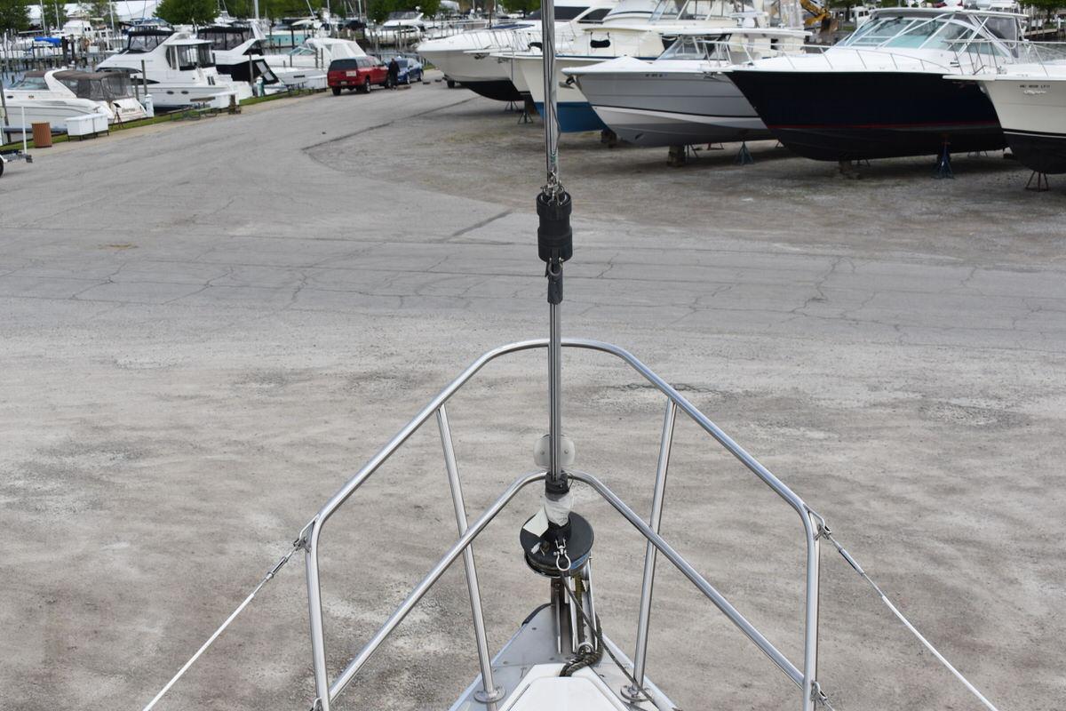 Bow view of a 1987 S2 9.2A at a boatyard.