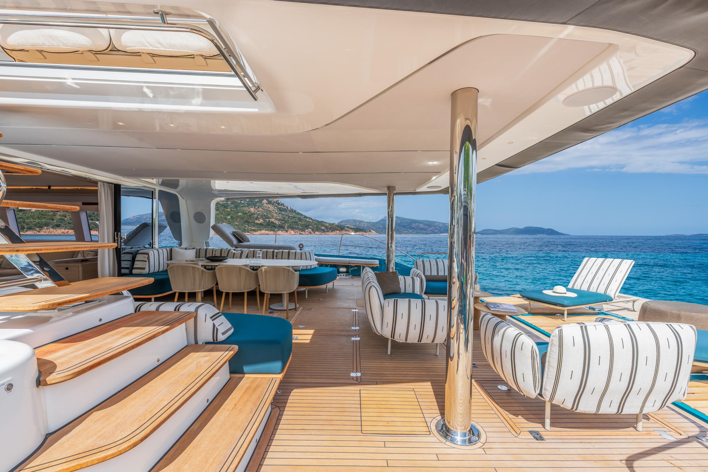 Luxurious Lagoon Eighty 2 yacht interior with elegant seating, ocean view, and modern design, 2025 model.