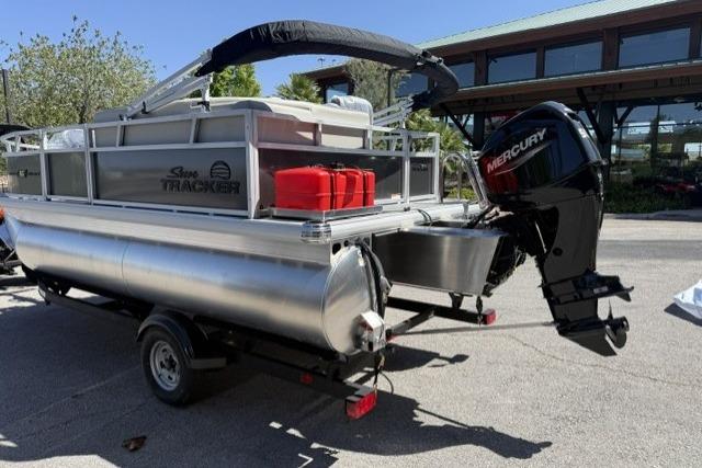 2026 Sun Tracker Bass Buggy 16 XL Select pontoon boat with Mercury outboard motor.