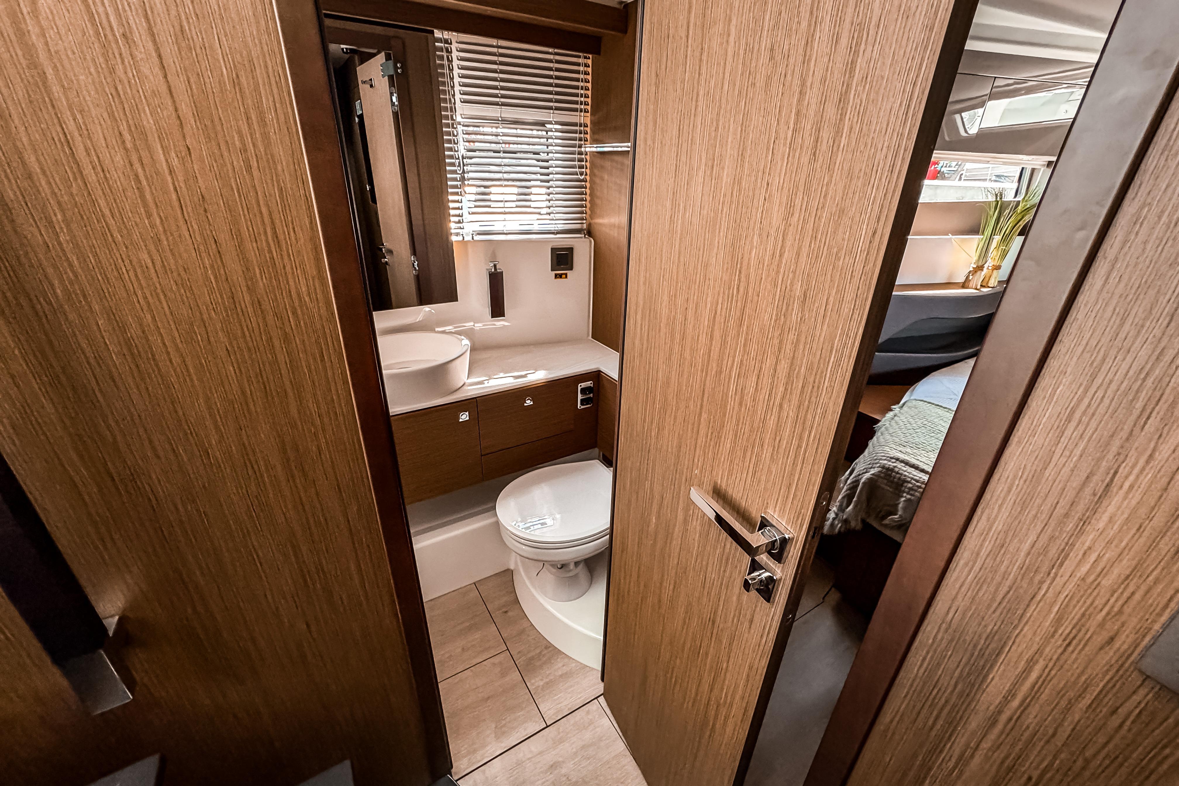 Interior view of Wellcraft 44 Explorer 2026 yacht bathroom.