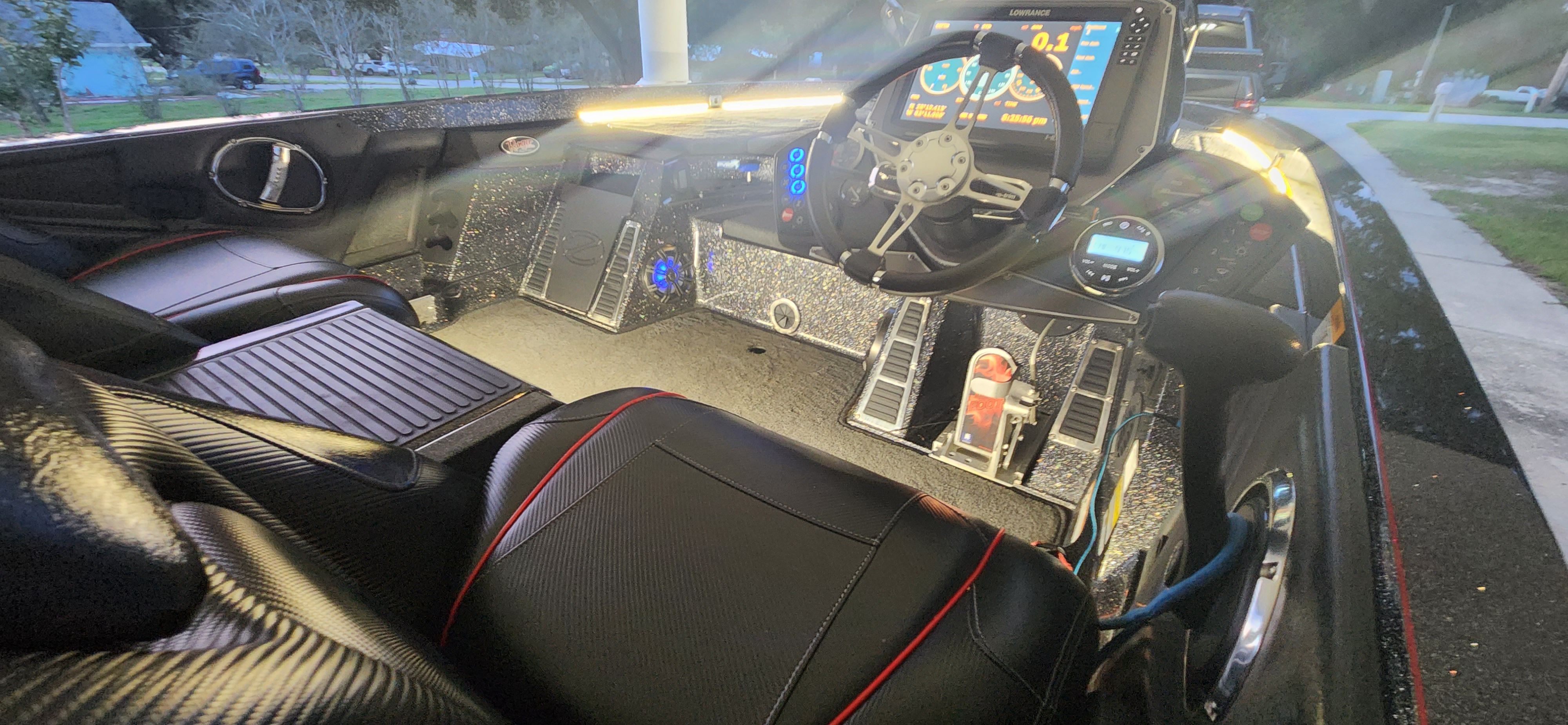 The interior of a 2017 Ranger Z520 Comanche with modern instruments and black upholstery.