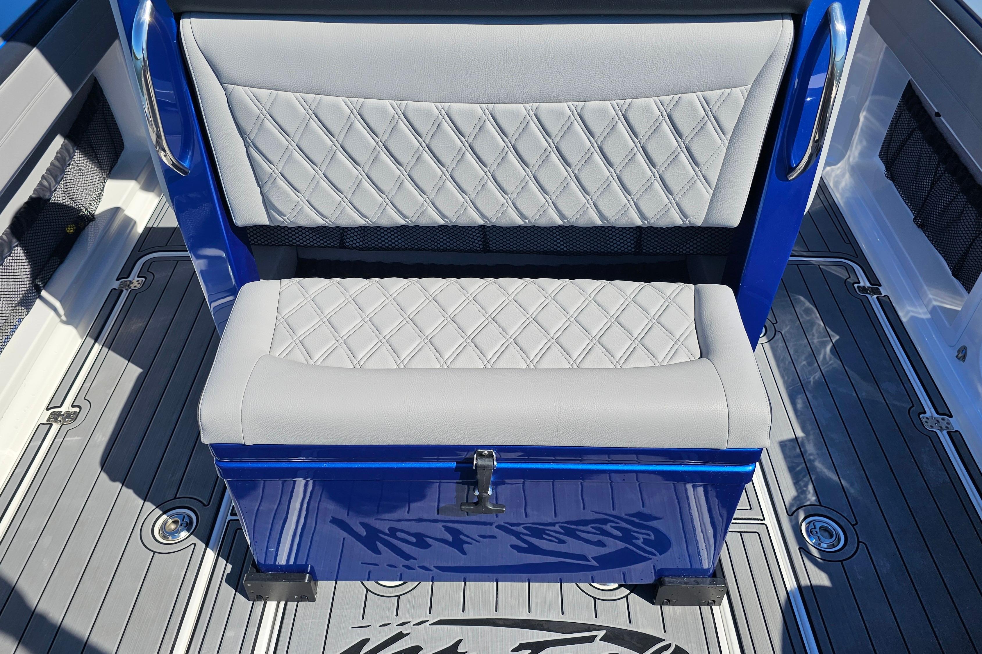 2025 Nor-Tech 390 Sport Center Console, featuring diamond-stitched seating and sleek blue accents.
