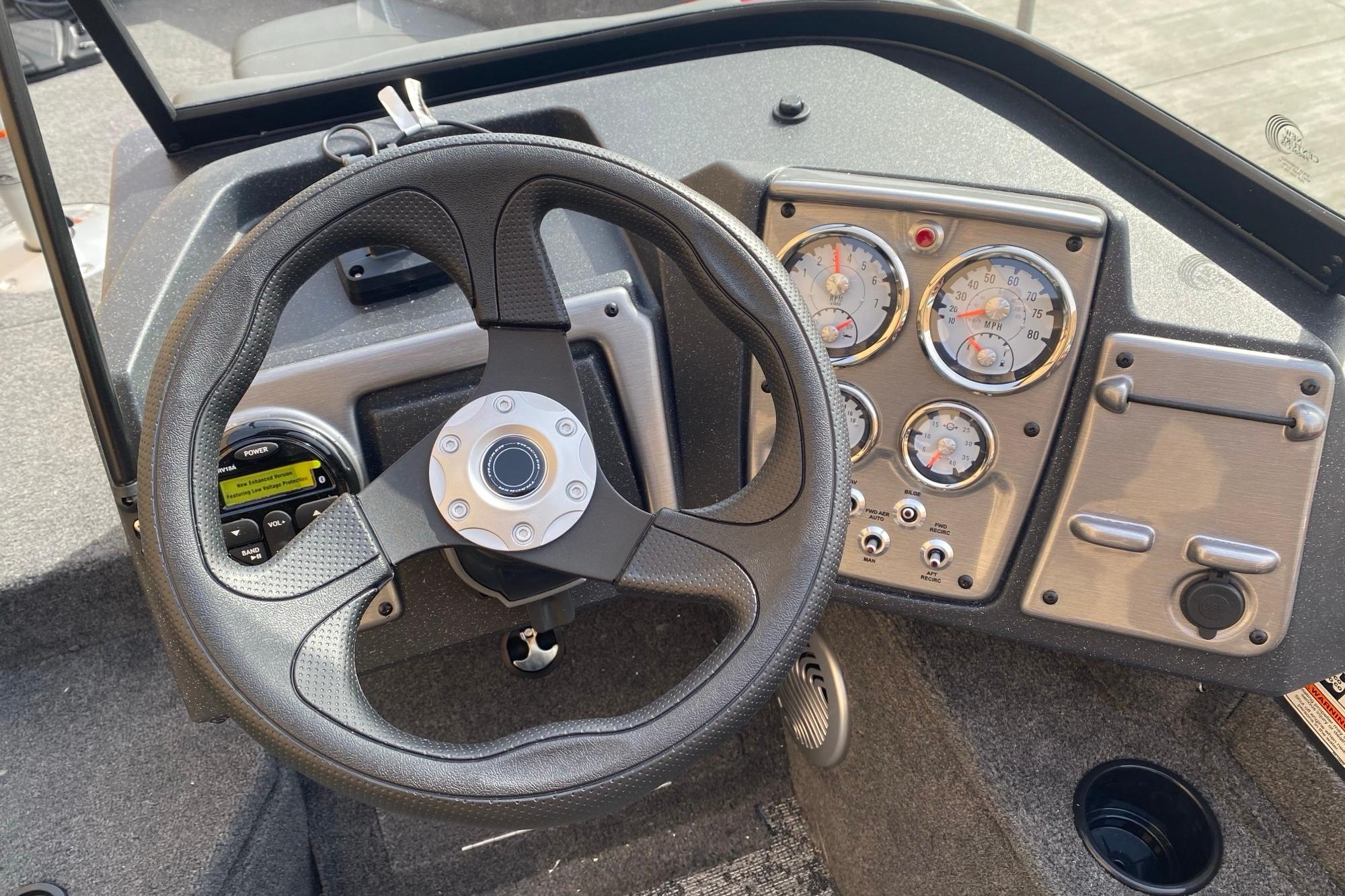Steering wheel and dashboard of 2026 Tracker Pro Guide V-175 Combo boat.