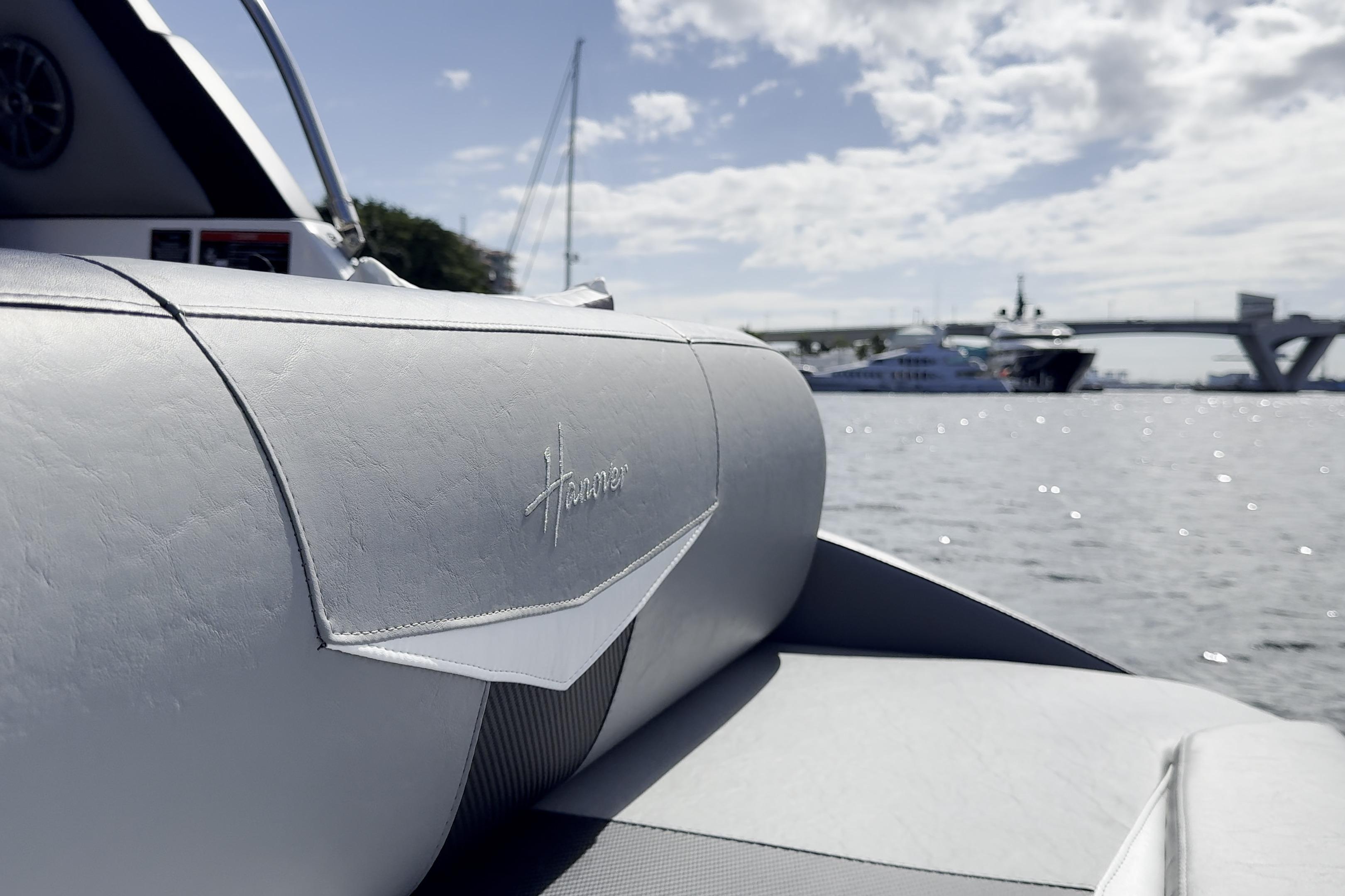 Luxurious Hanover 305 boat interior with waterfront view, 2027 model.