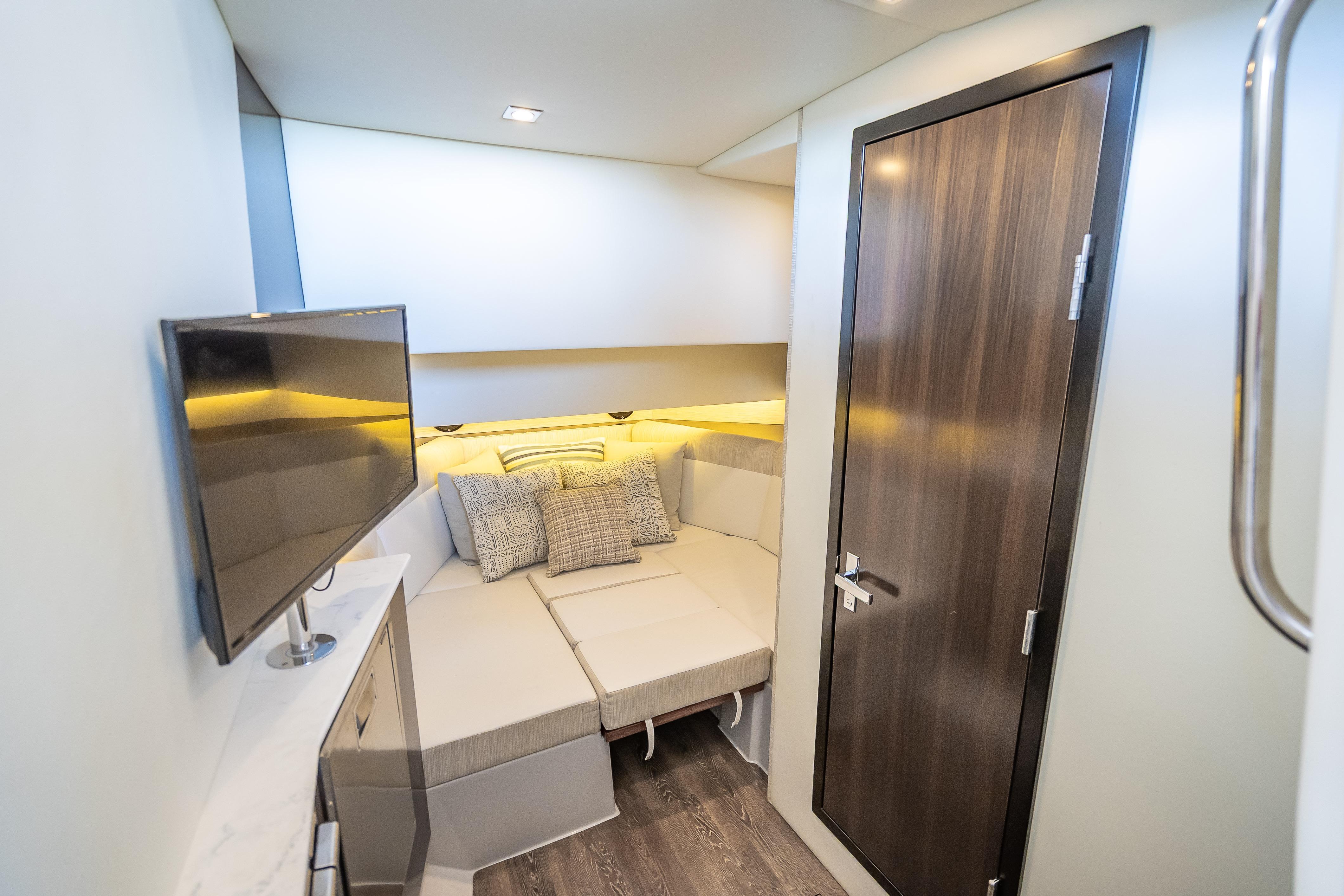 Luxurious cabin interior of 2022 Cruisers Yachts 38 GLS OB with modern amenities.