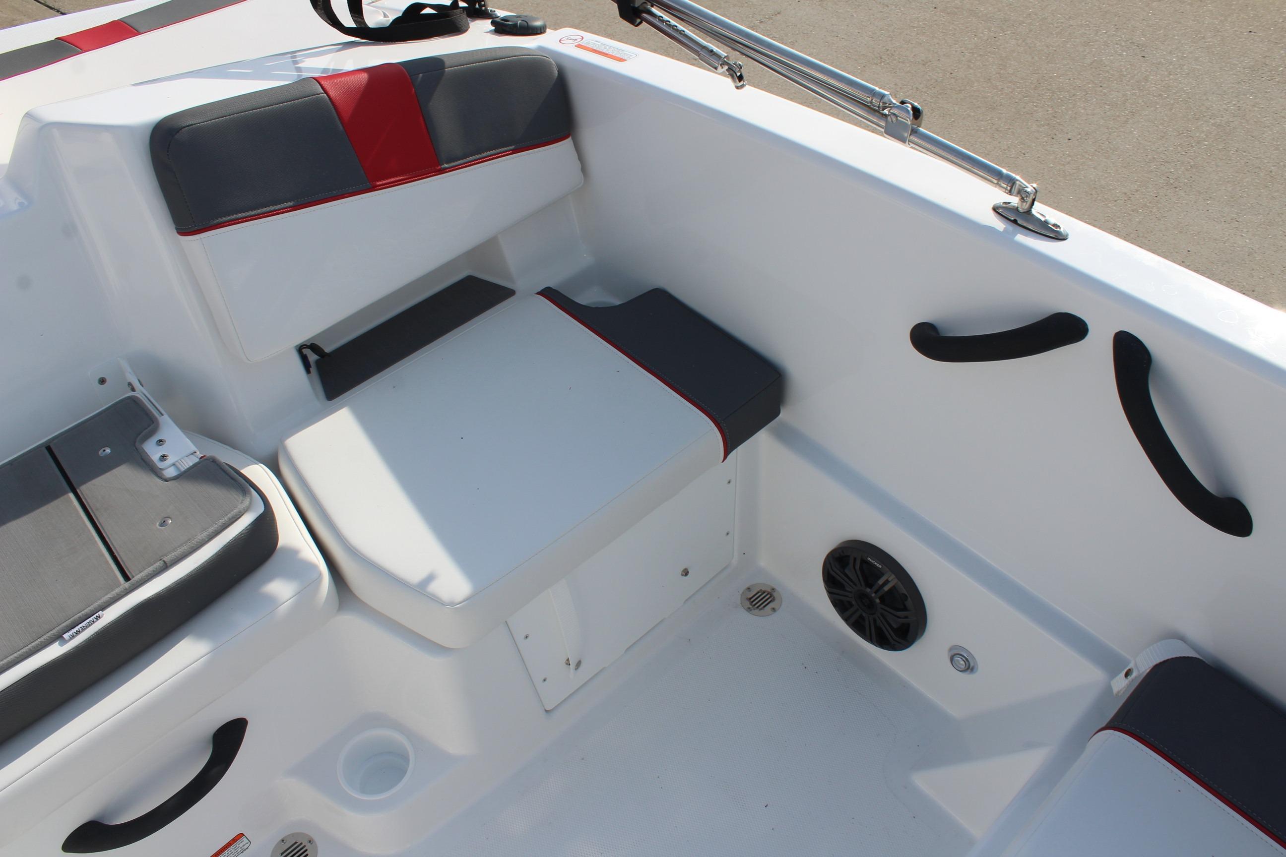 Interior seating of 2026 Tahoe T18 boat with modern design and speaker system.