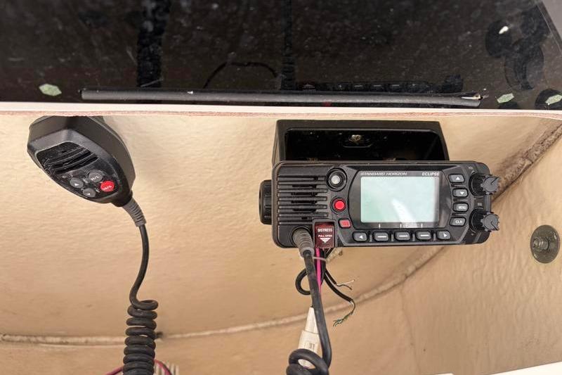 2023 Key West 203 FS boat radio system with microphone and control panel.