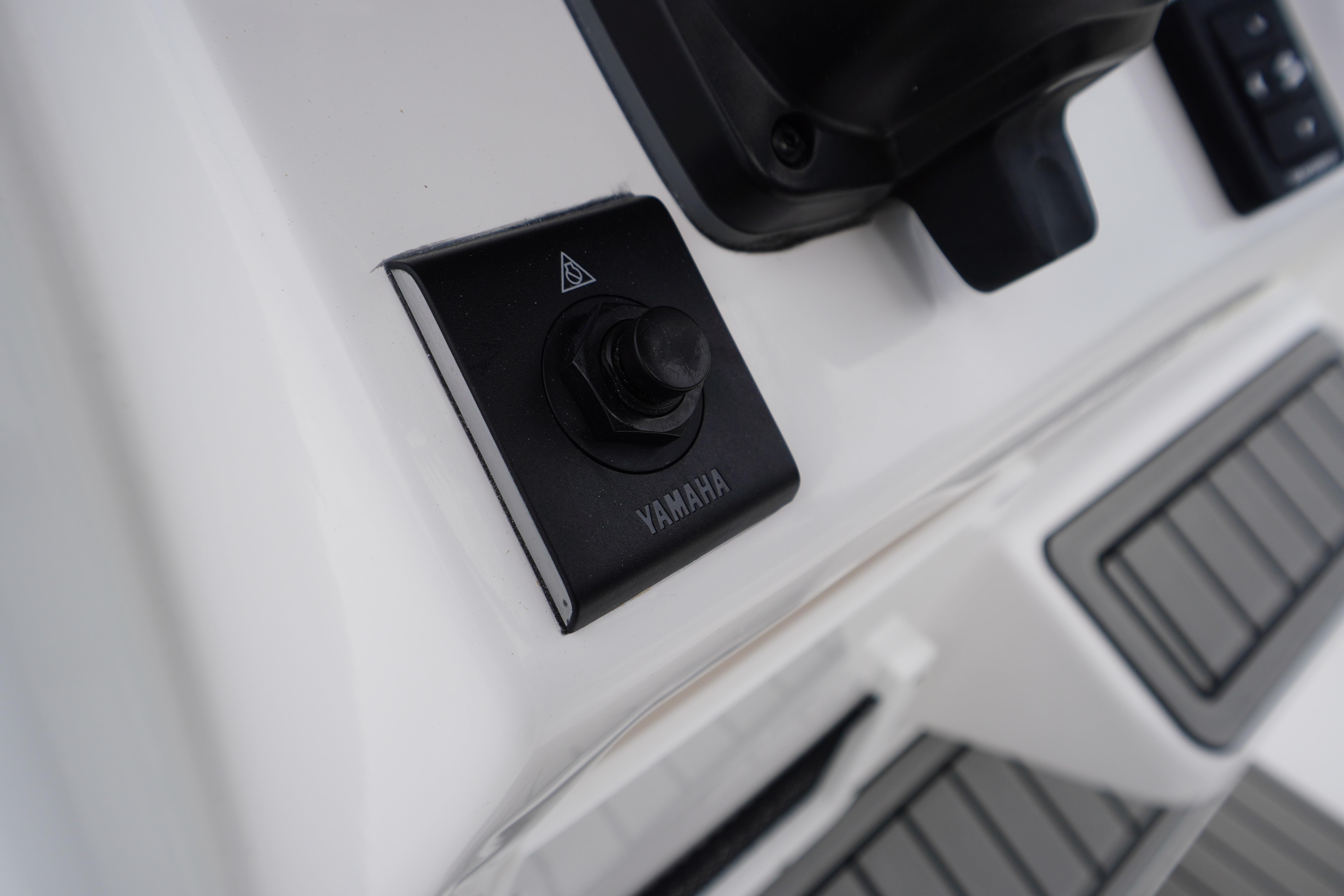 Close-up of Yamaha control panel on 2026 Tidewater 232 SS boat dashboard.