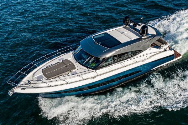 2021 Riviera 5400 Sport Yacht cruising on open water.