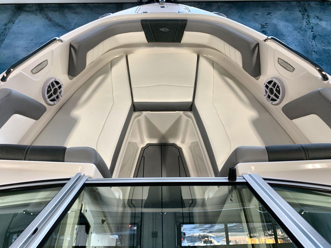 2025 Chaparral 21 SSi boat interior with spacious seating and modern design.