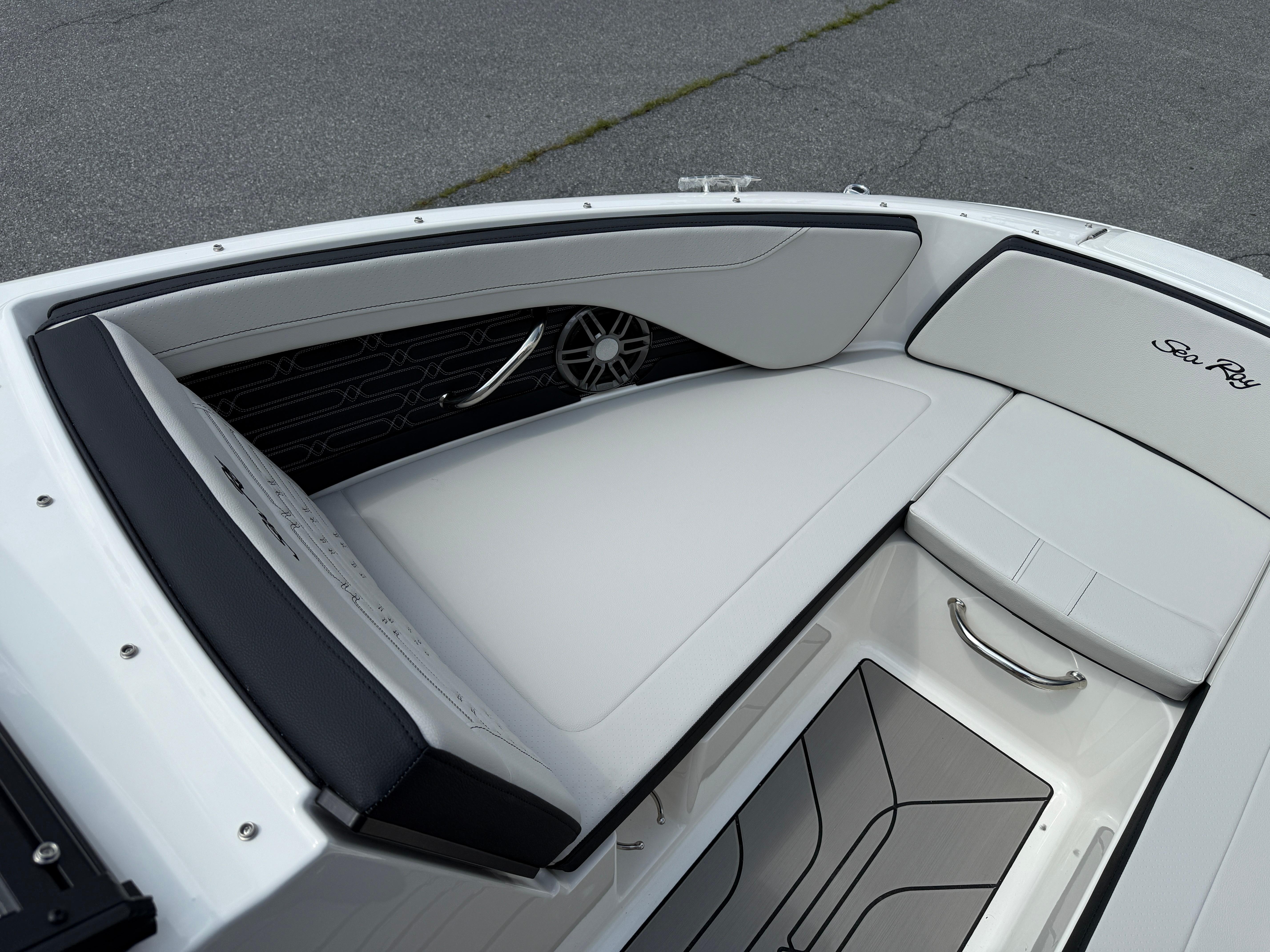 2026 Sea Ray SPX 210 Outboard boat interior with sleek seating and modern design.