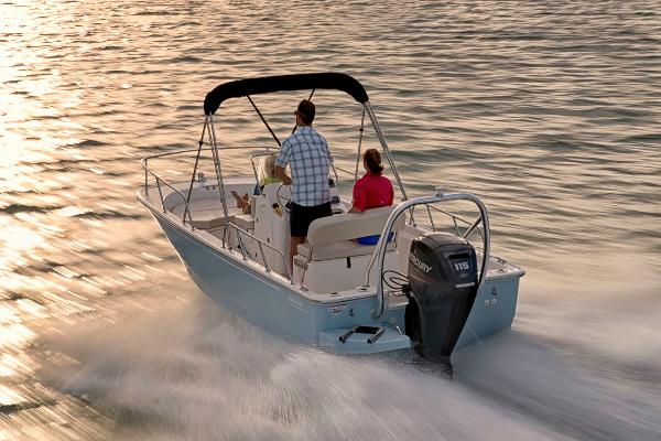 Manufacturer Provided Image: 2024 Boston Whaler 170 Montauk boat cruising on water at sunset.