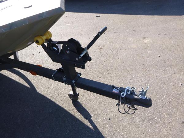 Trailer hitch of 2024 Tracker Grizzly 1648 SC boat on pavement.