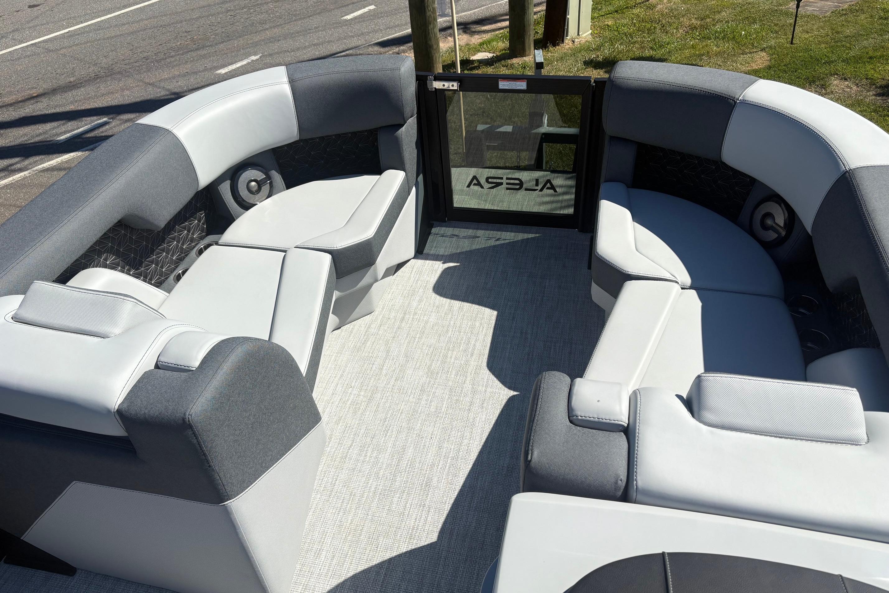 2026 Alera 23Q boat interior with gray seating and modern design.