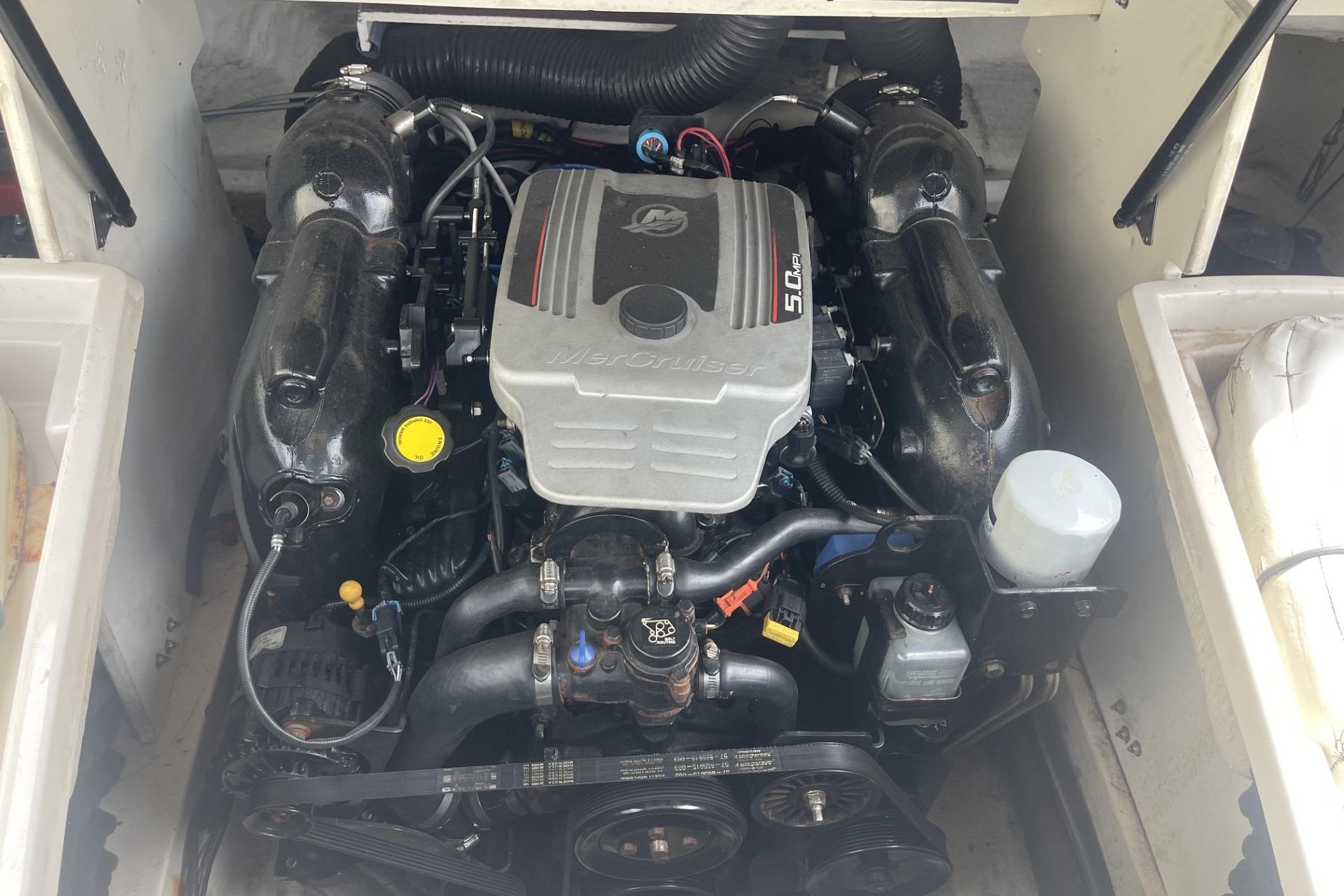 Engine of 2010 Sea Ray 230 Bow Rider Select boat, showcasing MerCruiser 5.0L V8.