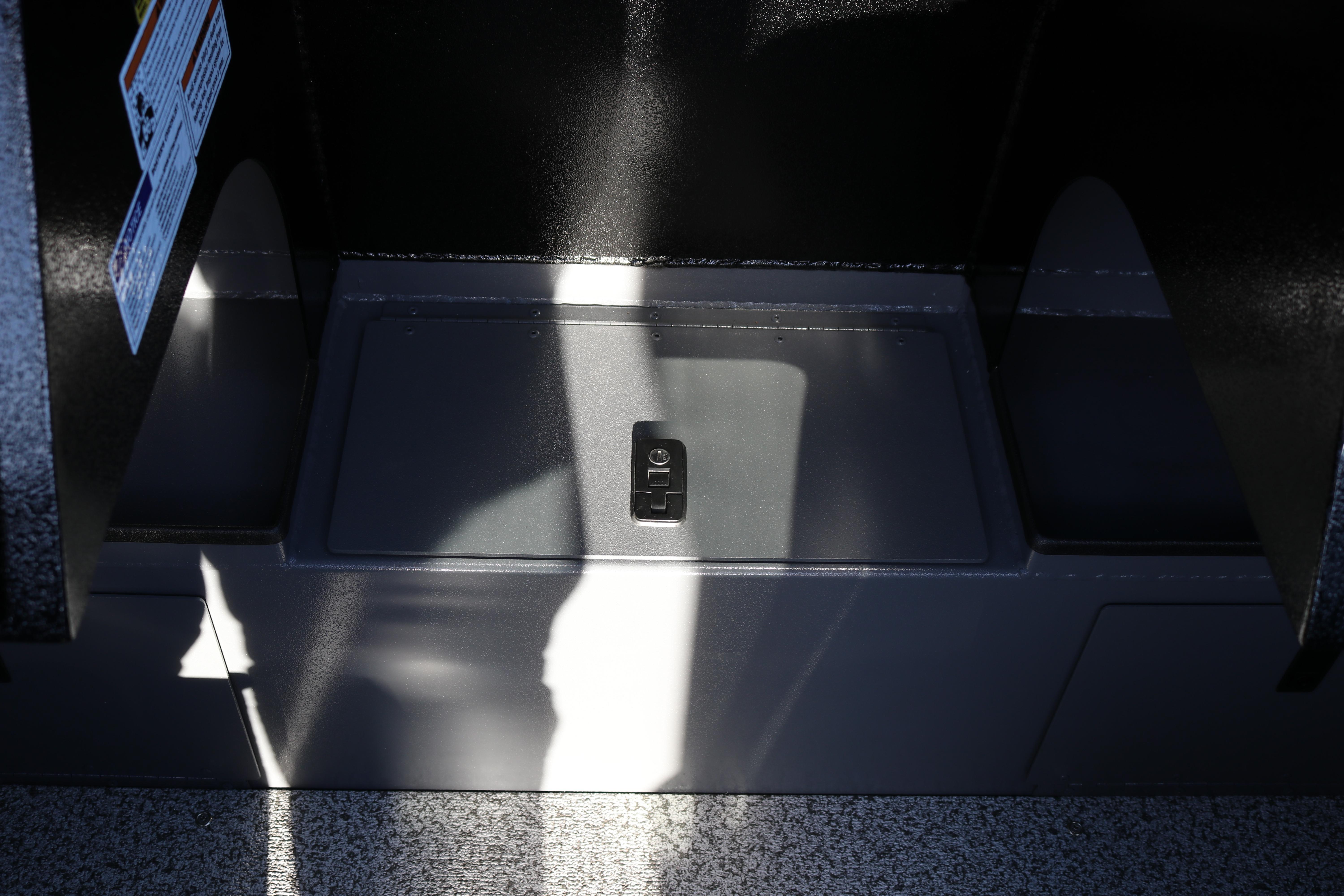 2026 Alumaweld Stryker X202 boat interior detail with storage compartment.