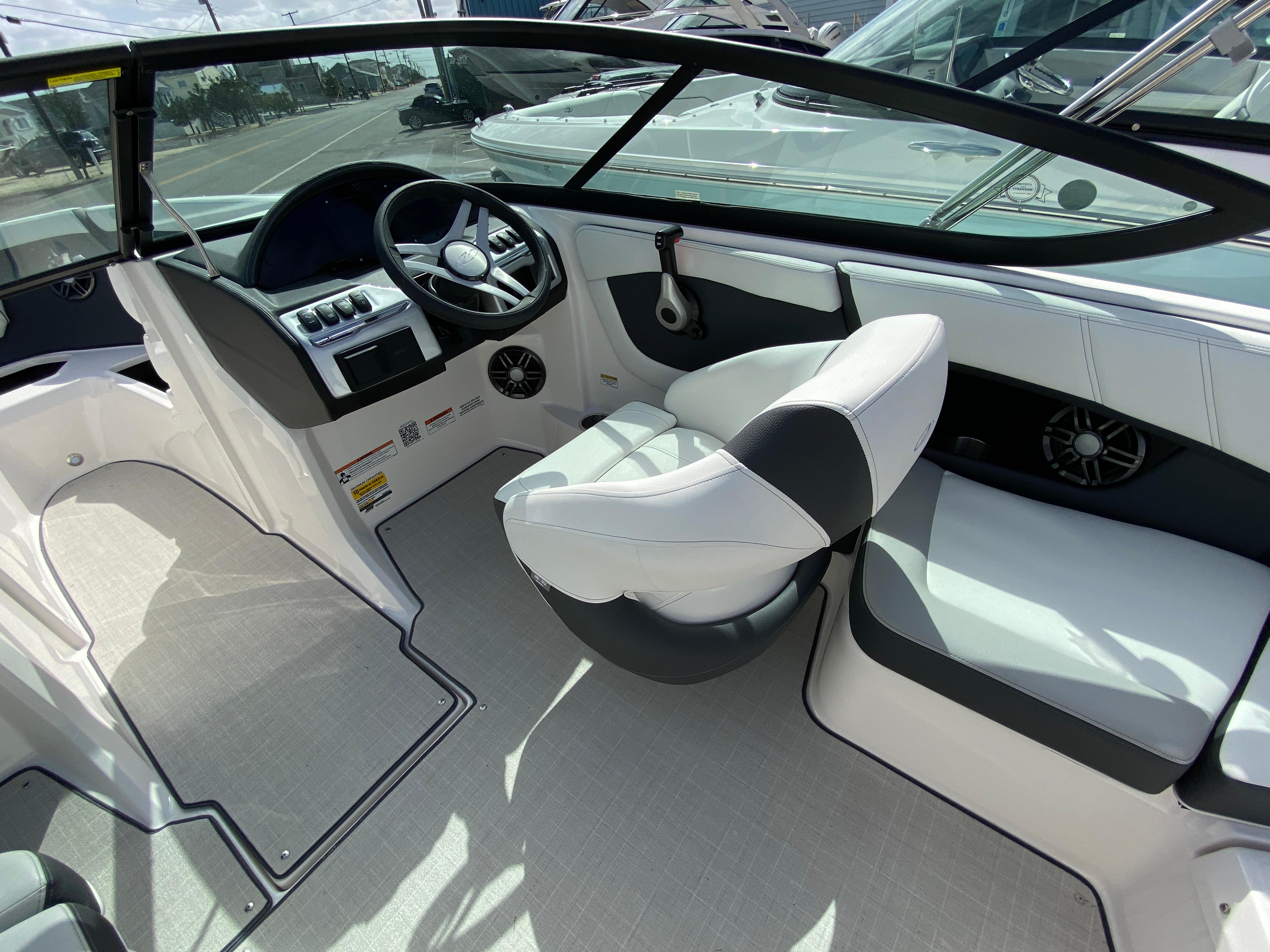 2026 Regal 21 OBX boat interior with modern steering and seating.