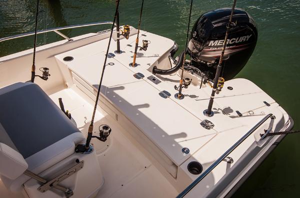 Manufacturer Provided Image: 2014 Boston Whaler 210 Dauntless fishing boat with Mercury engine and rod holders.