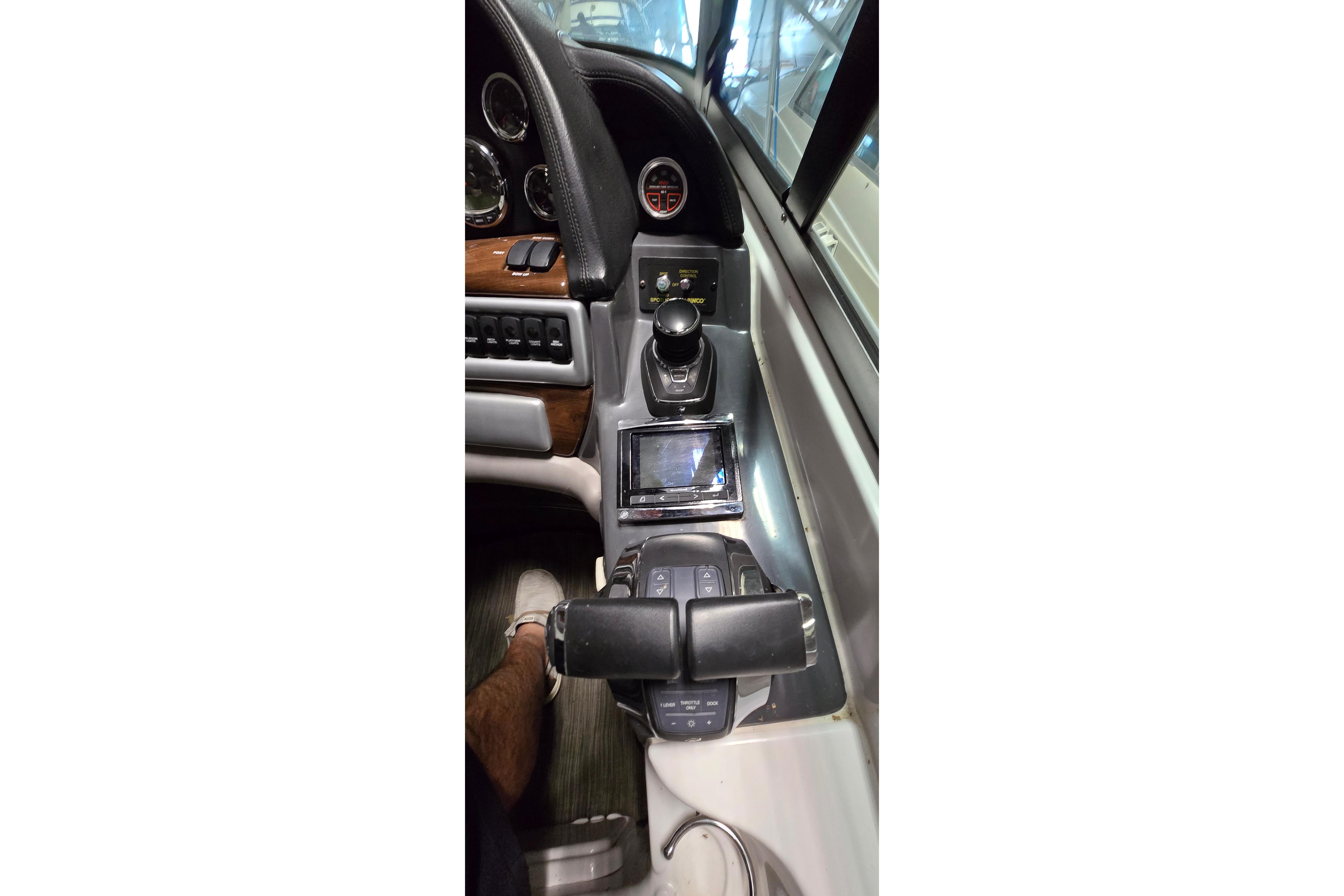 2018 Four Winns V355 boat dashboard with controls and gauges.