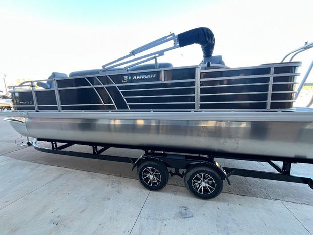 2025 Landau Atlantis 23C Cruise pontoon boat on trailer.