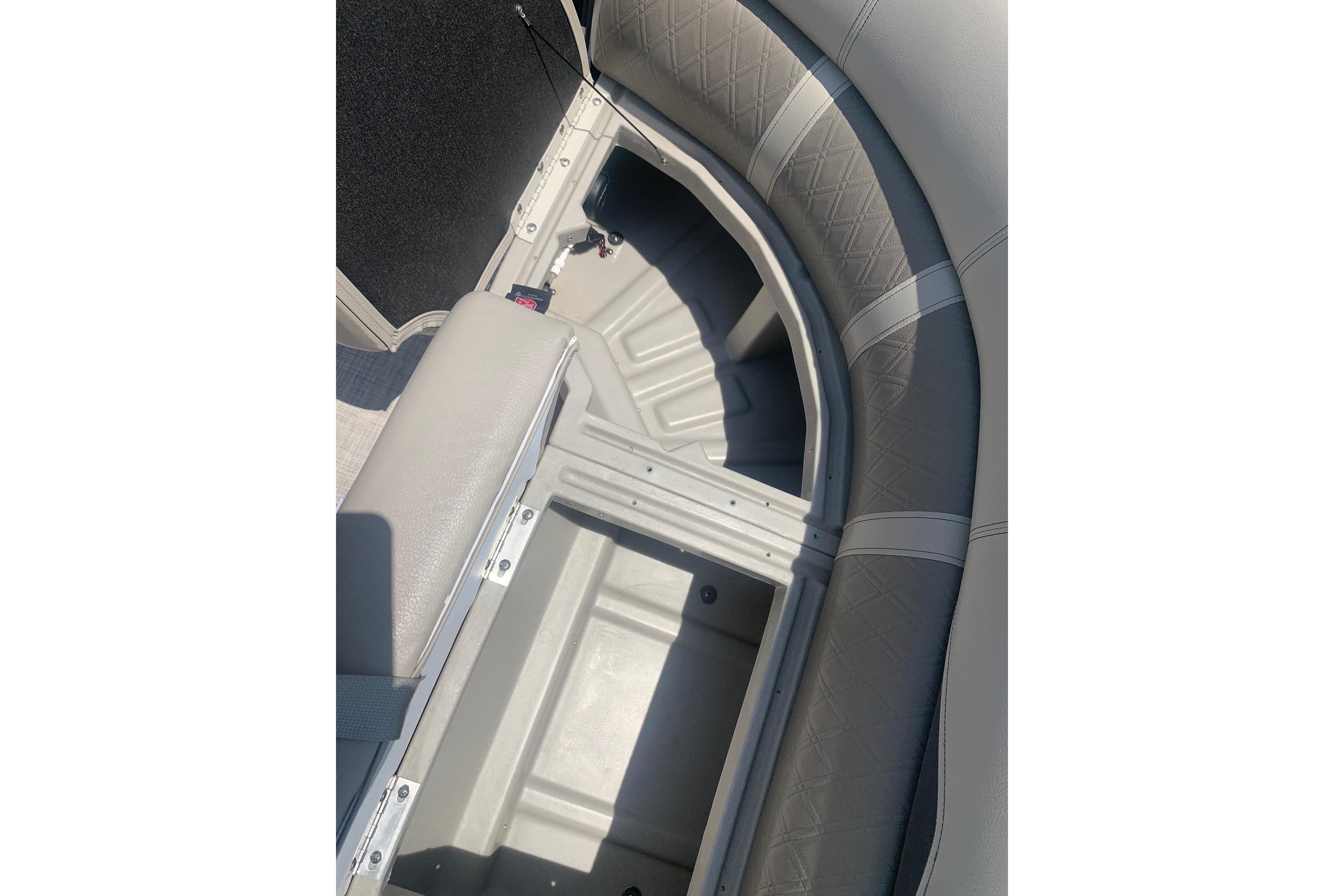 2023 Silver Wave 2410 SW3 CLS boat interior storage compartment with cushioned seating.