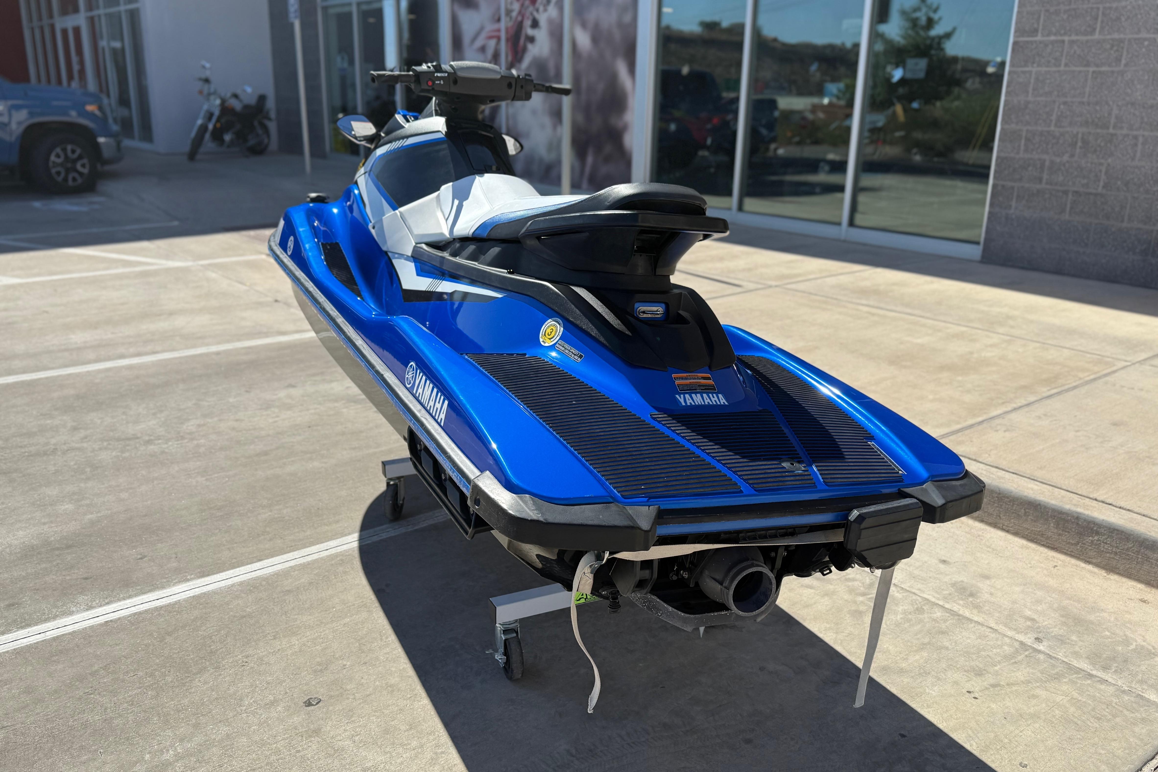 2017 Yamaha WaveRunner EX Deluxe in blue, parked outdoors on a sunny day.