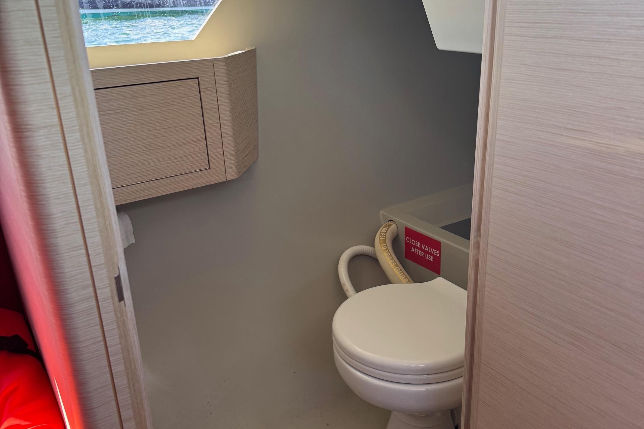 2023 Saffier 33 Life yacht interior bathroom with modern design and compact toilet.