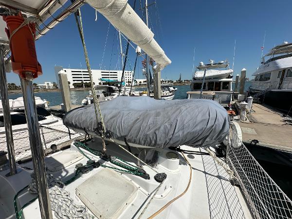 Concordia 52 sailboat docked at marina, covered mainsail, 1989 model.