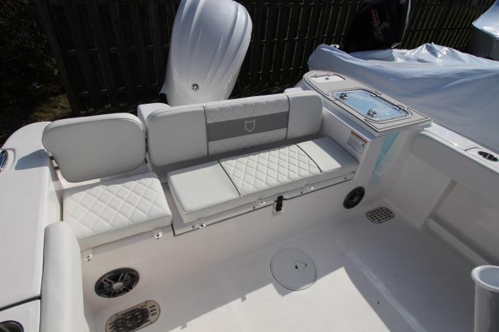 Interior of 2026 Sea Fox 248 Commander with cushioned seating.