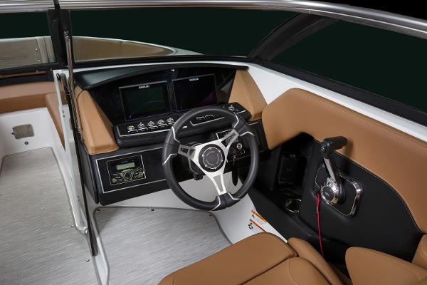 Manufacturer Provided Image: 2025 Four Winns H4 boat cockpit with modern steering and control panel.