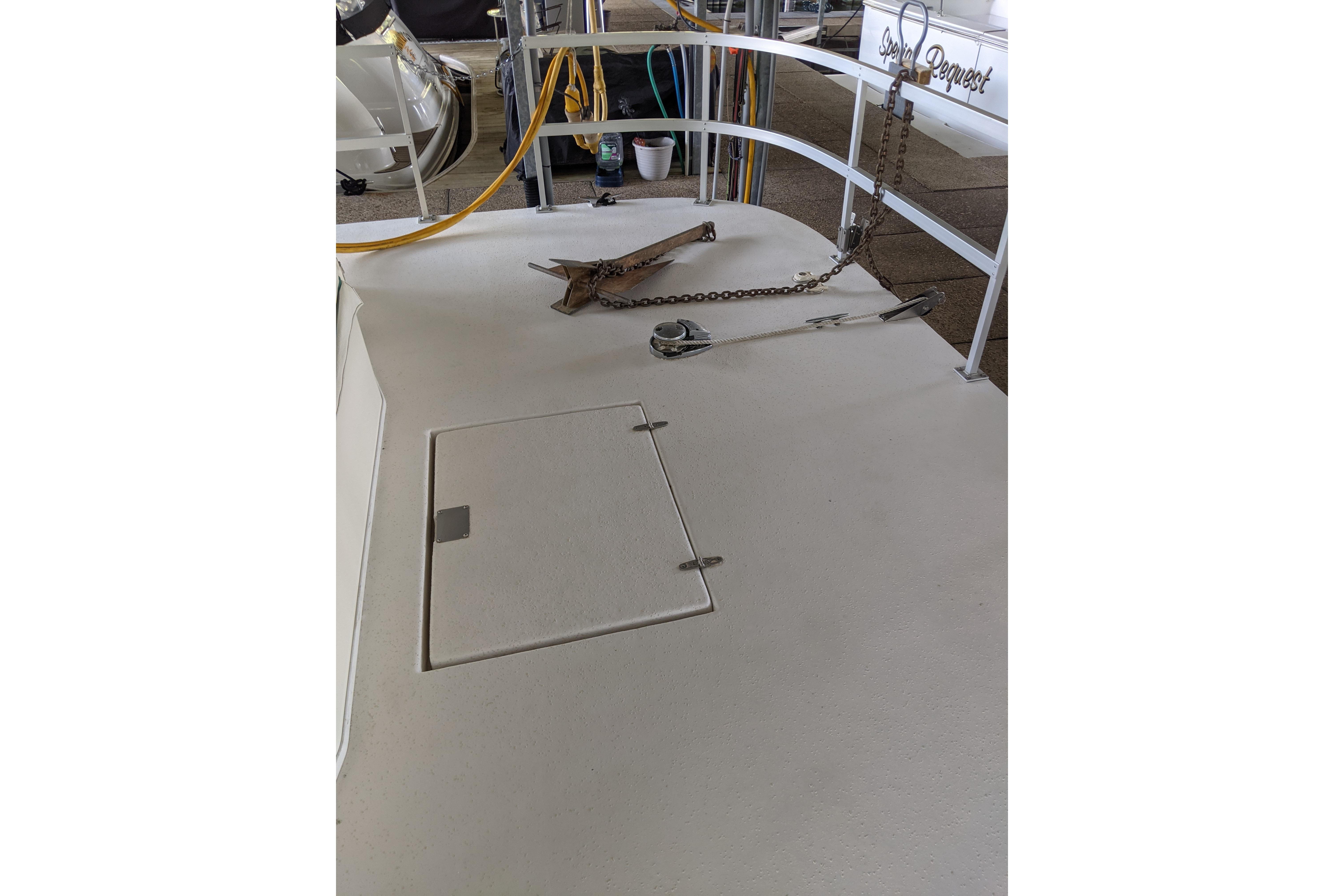 2001 Gibson 50 Cabin Yacht deck with anchor and hatch.