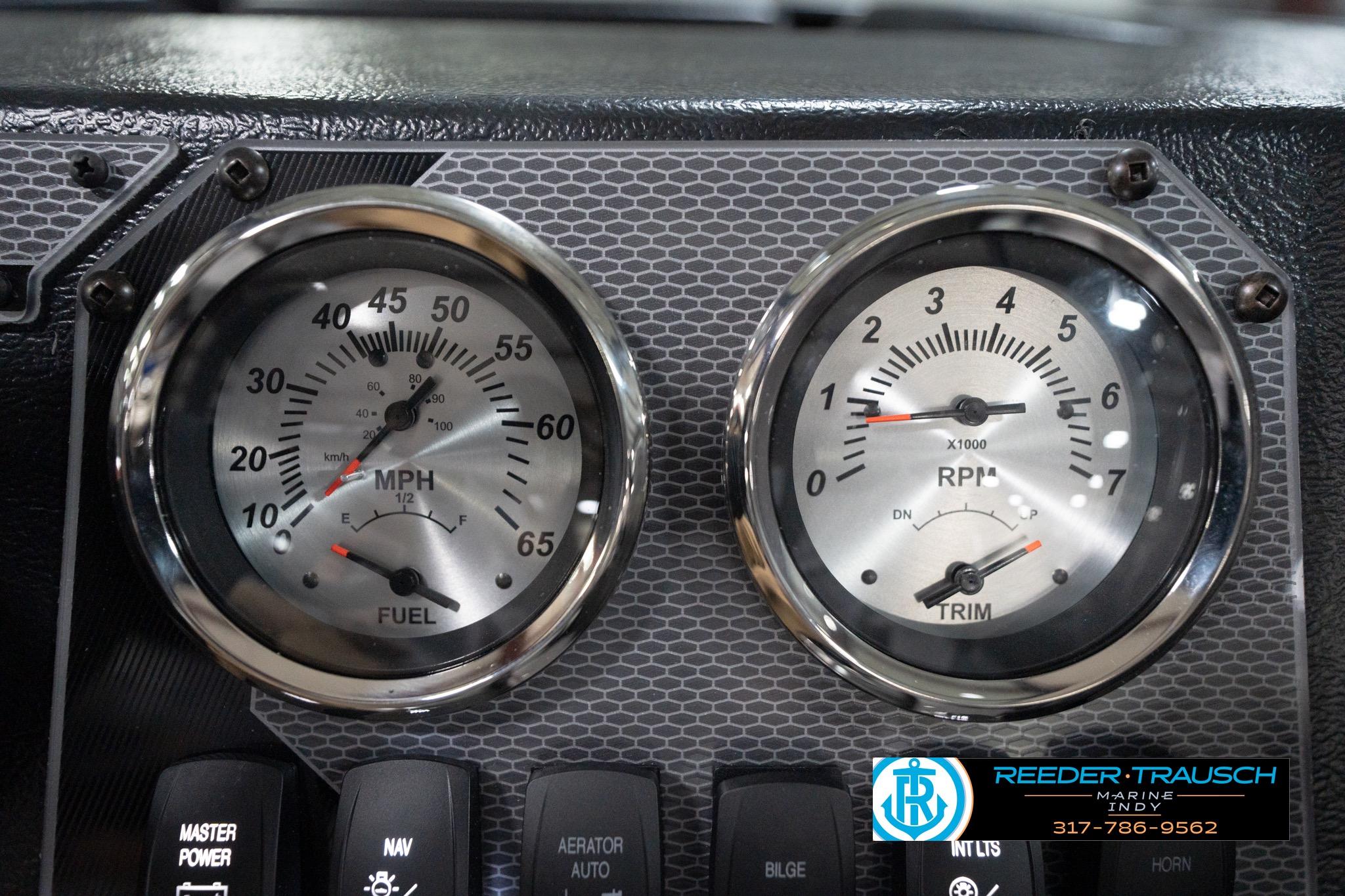 Dashboard of 2026 Lund 1800 Explorer Sport with speedometer and RPM gauges.