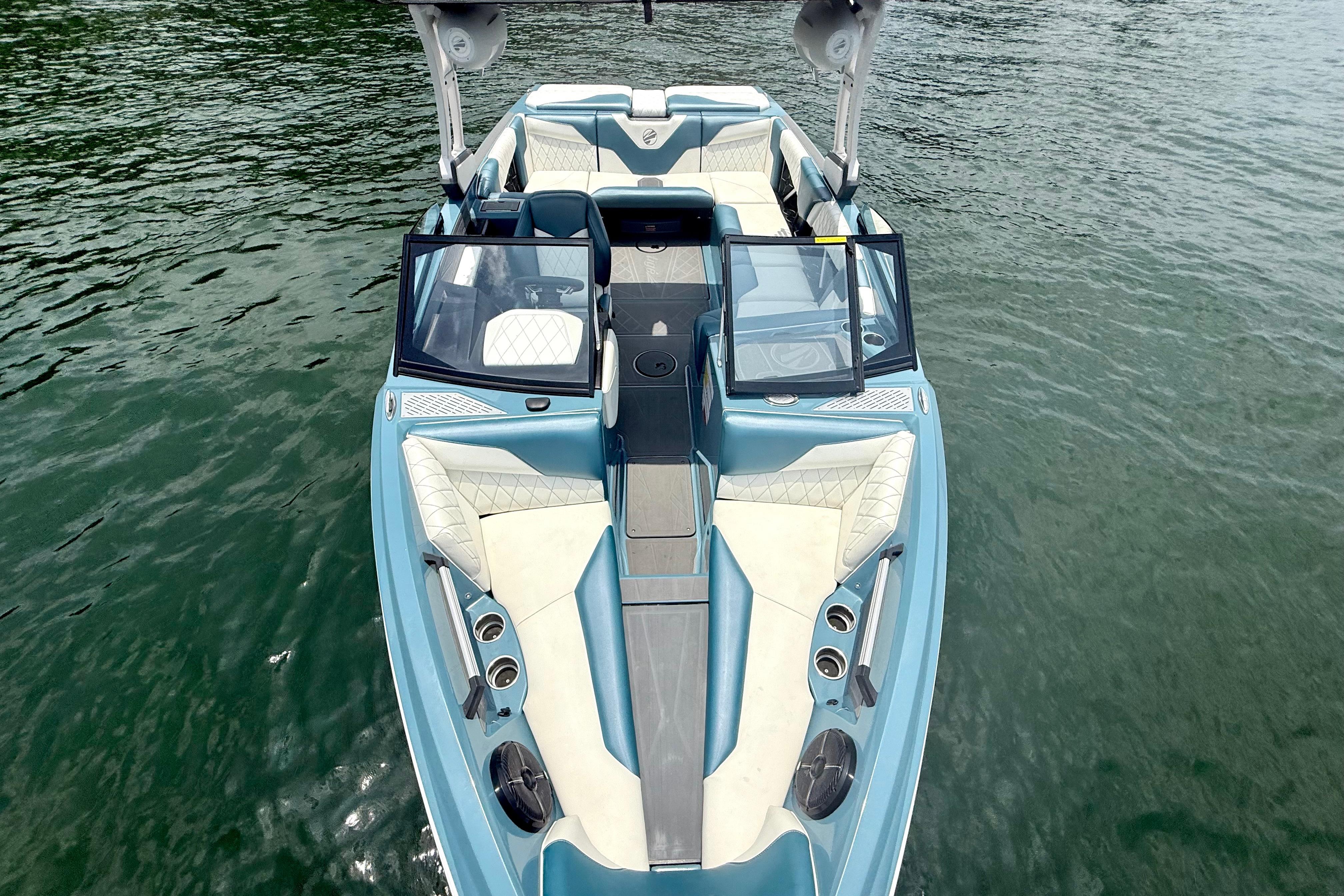 2021 Tige Z3 boat with sleek design and spacious seating on calm water.