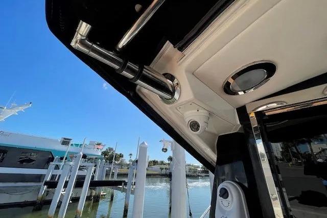 2016 Sea Ray Sundancer 510 yacht docked, showcasing sleek design and modern features.