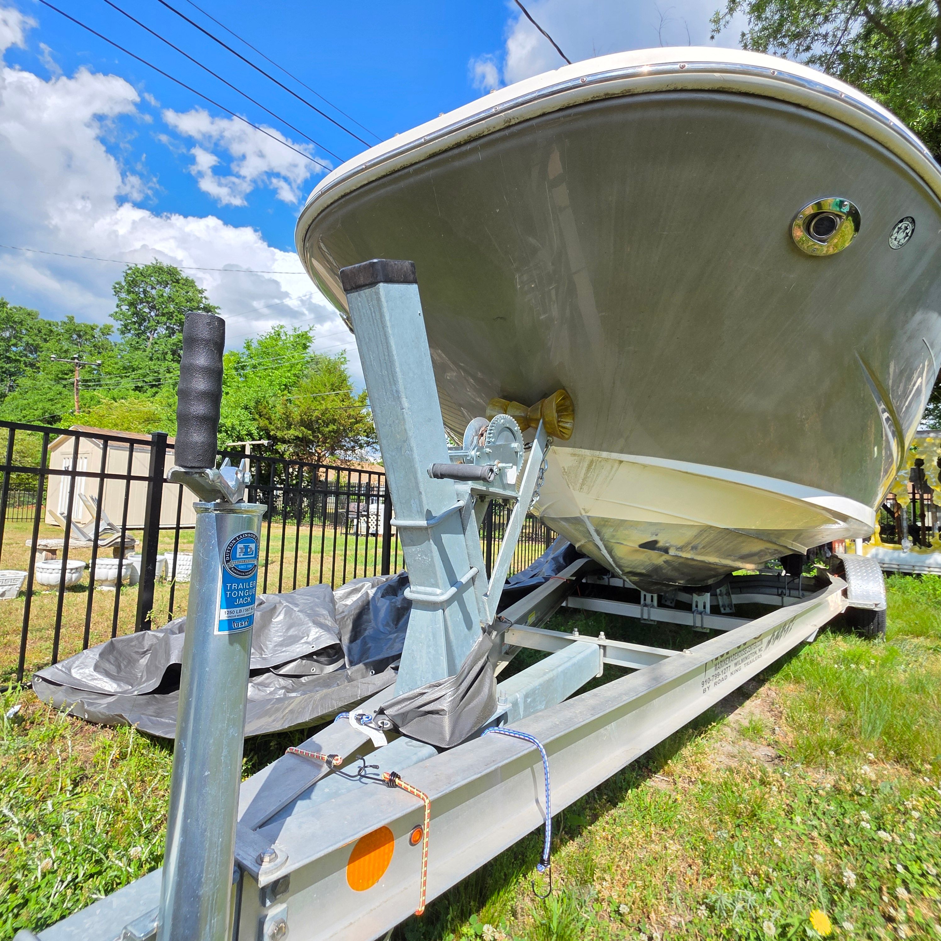 2007 Sea Ray 260 Sundeck on trailer outdoors.