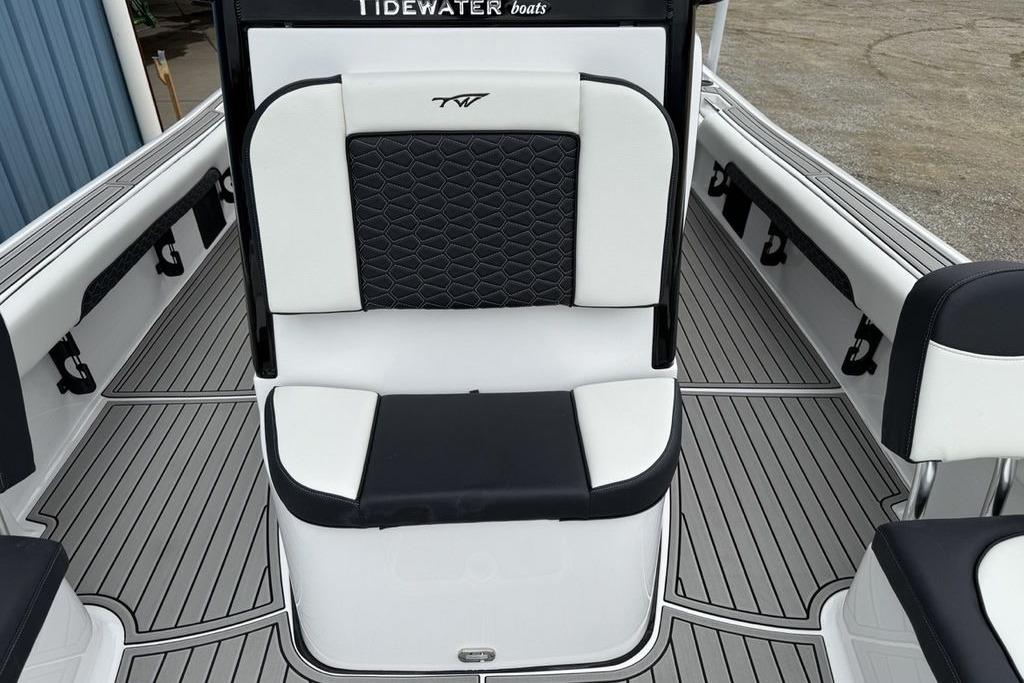 2026 Tidewater 2500 Carolina Bay boat interior with black and white seating and deck.