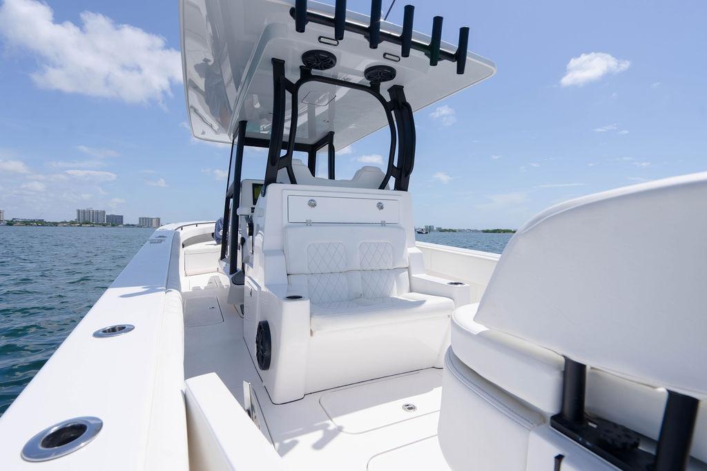 2027 Reef Runner 340 boat interior with sleek seating and ocean view.