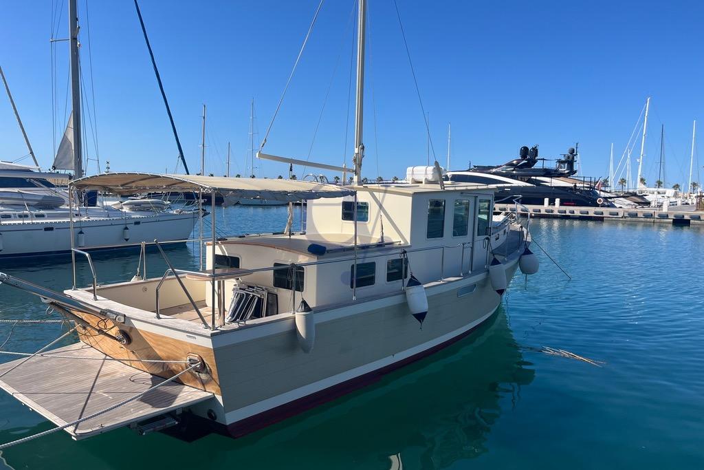 Sibma Navale Italiana Armstrong 12 boat, 2012 model, docked in a marina.