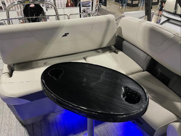2022 Starcraft SLS-3Q DH boat interior with seating and table.