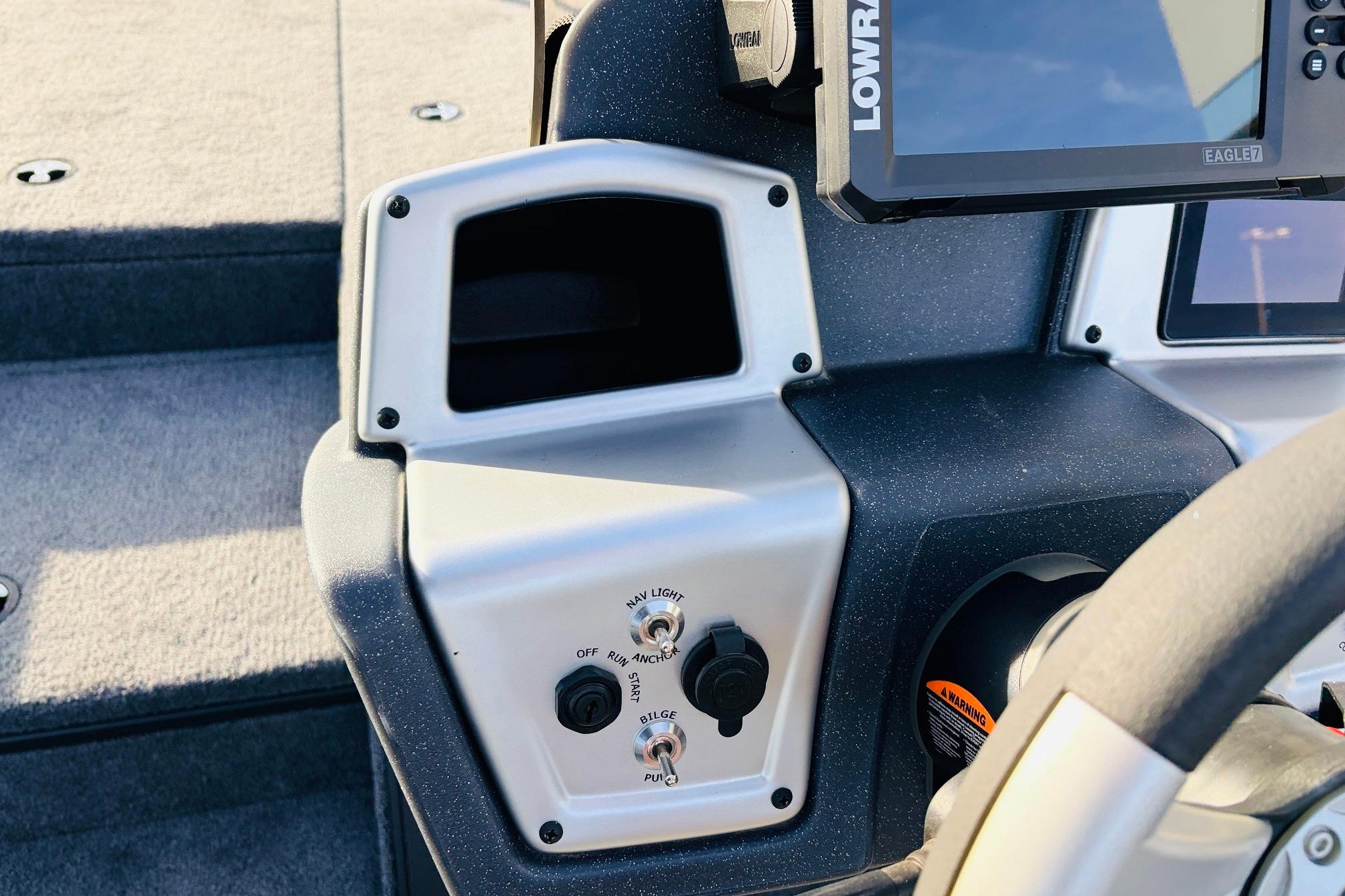 2025 Tracker Savage 215 boat dashboard with controls and navigation system.