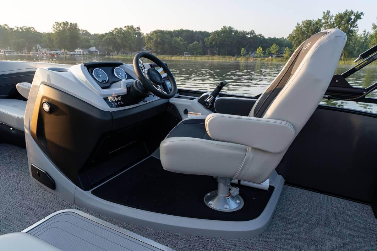 Manufacturer Provided Image: 2026 Barletta Cabrio 22UC boat interior with captain's chair and control panel.