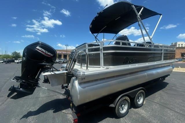 2026 Sun Tracker Fishin' Barge 20 DLX pontoon boat with Mercury outboard motor.