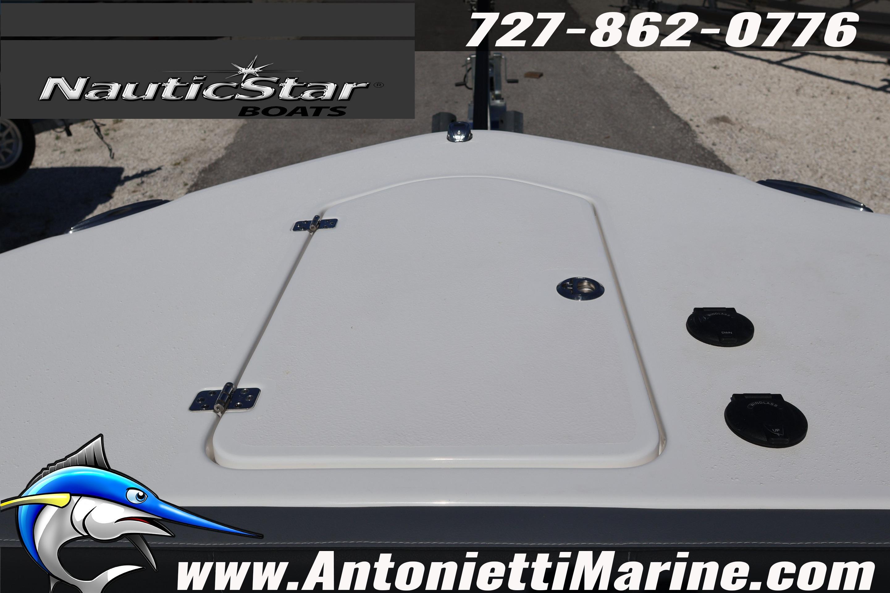 2026 NauticStar 292 Legacy boat deck with logo and contact information.