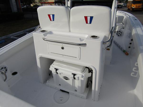 2025 Wellcraft 243 Fisherman boat interior with seating and storage area.