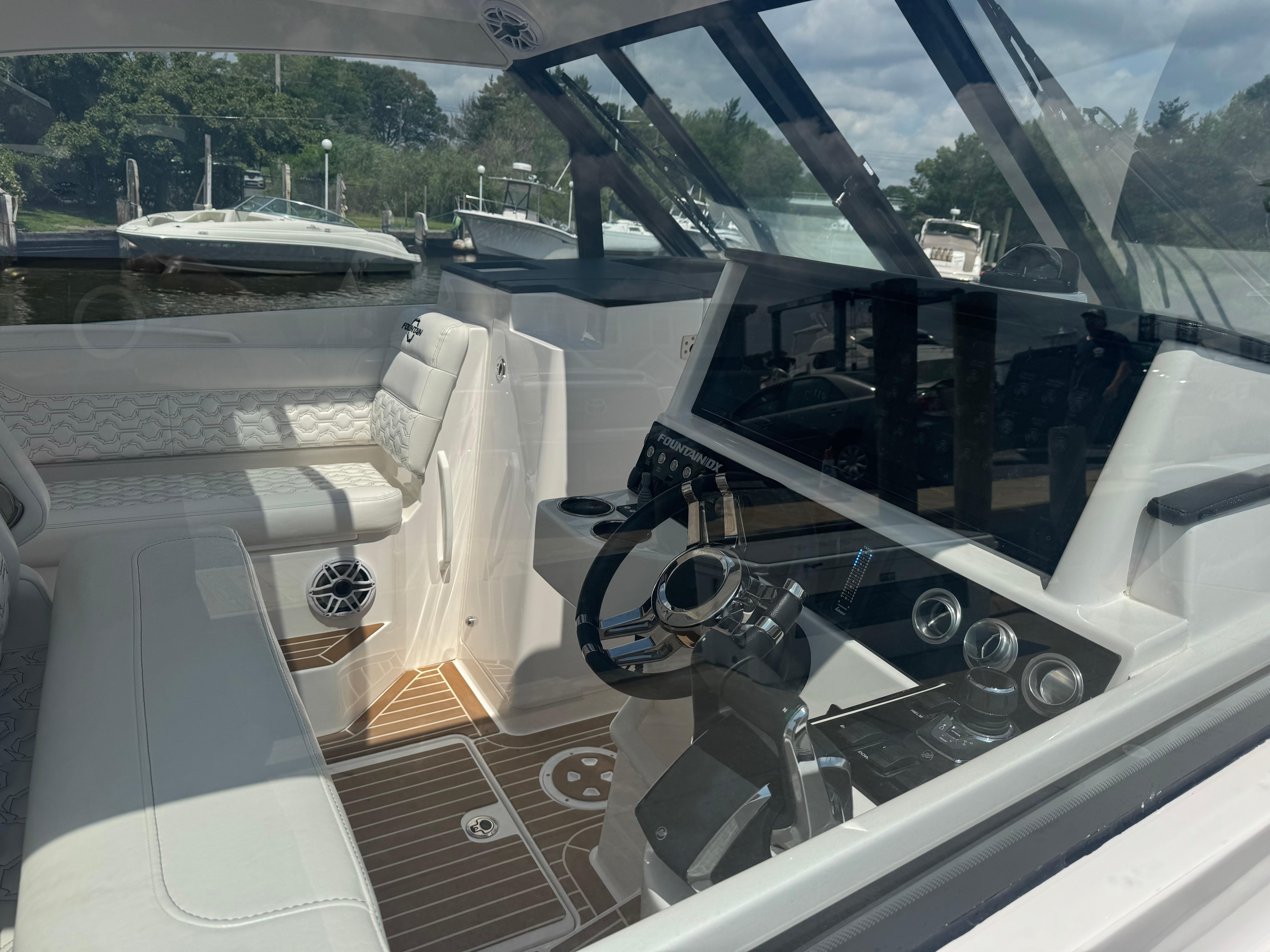 Interior view of 2025 Fountain 39 DX boat with modern controls and seating.