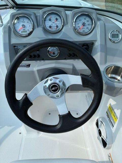 The image shows the dashboard of a 2012 Chaparral 19 H2O Sport boat.