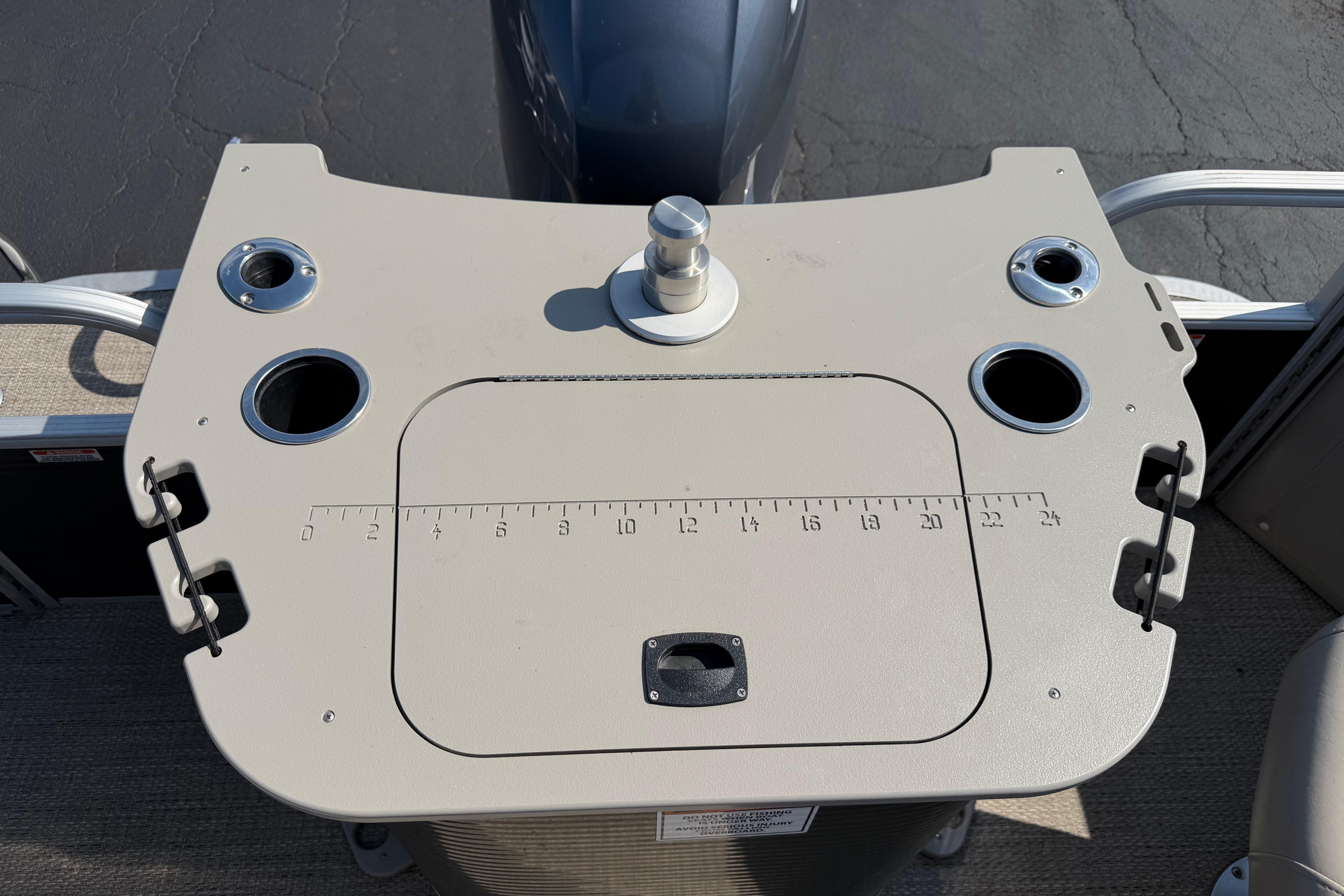 2018 Bennington 21 SF boat console with cup holders and measurement markings.